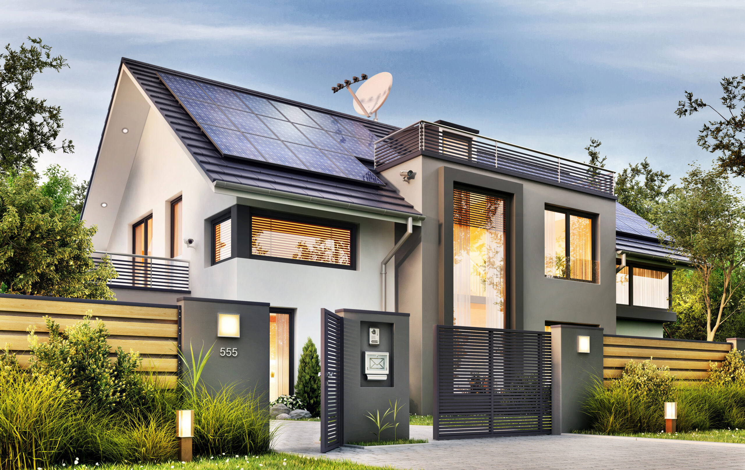 Beautiful modern house with garden and solar panels on the gable roof